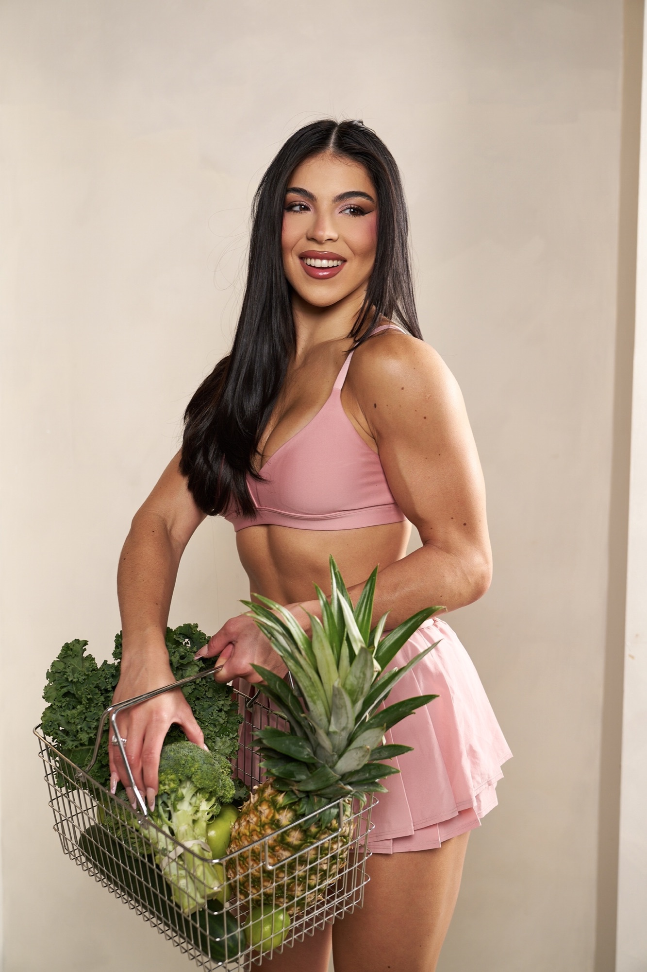 Diana Sosa with a basket of fresh produce